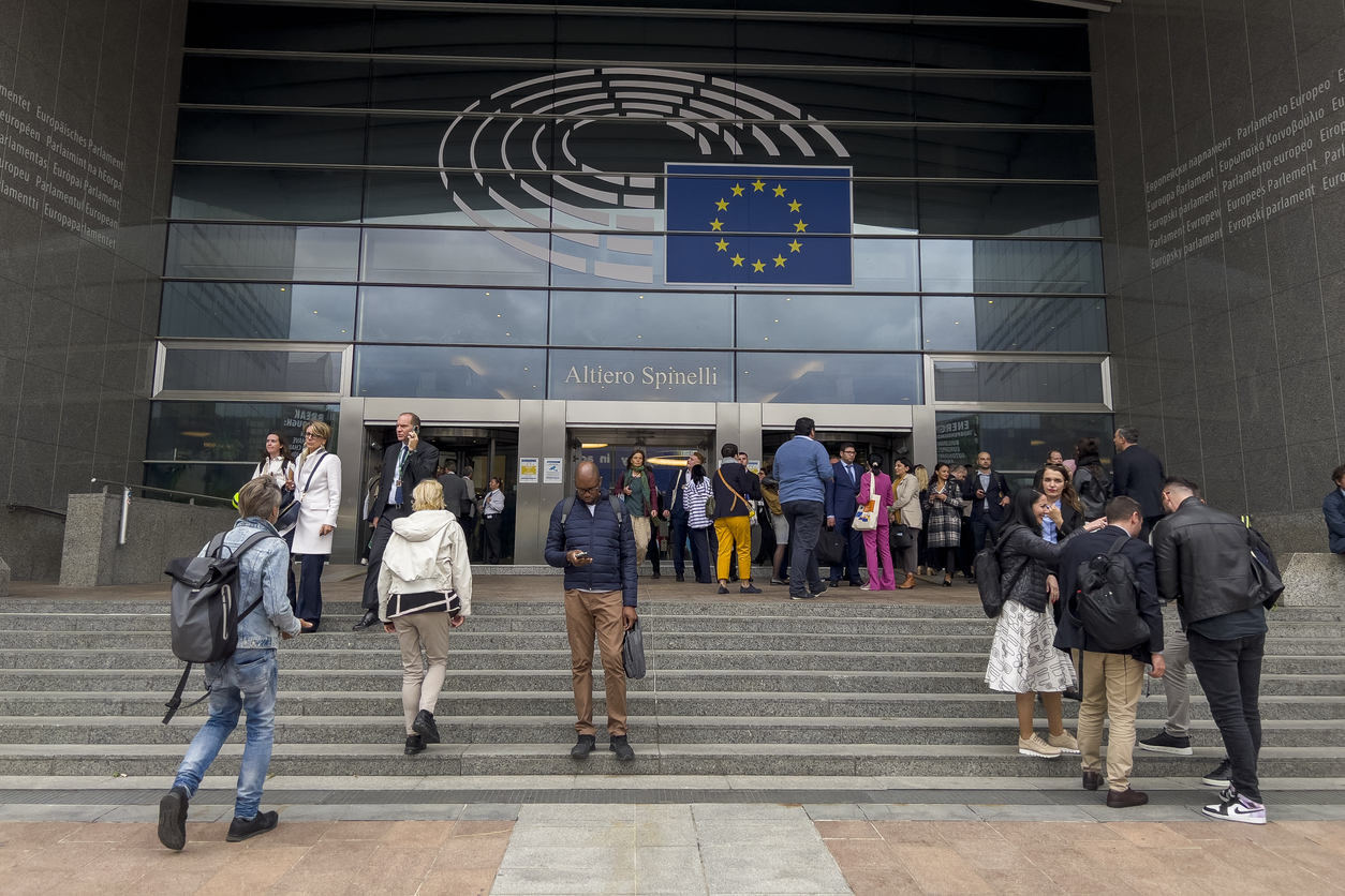 People walk outside of the European Parliament in Brussels, Belgium on September 20, 2023.