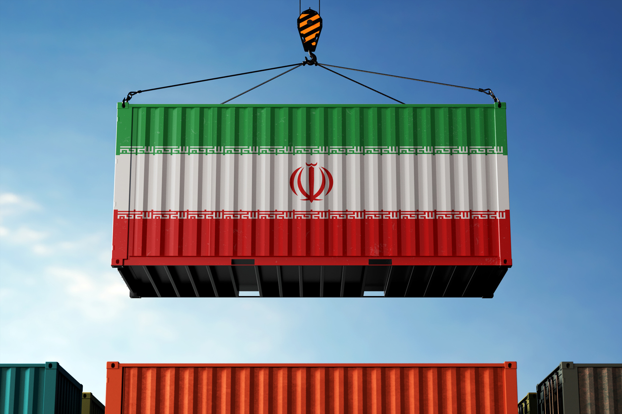 Iran trade cargo container hanging against clouds background