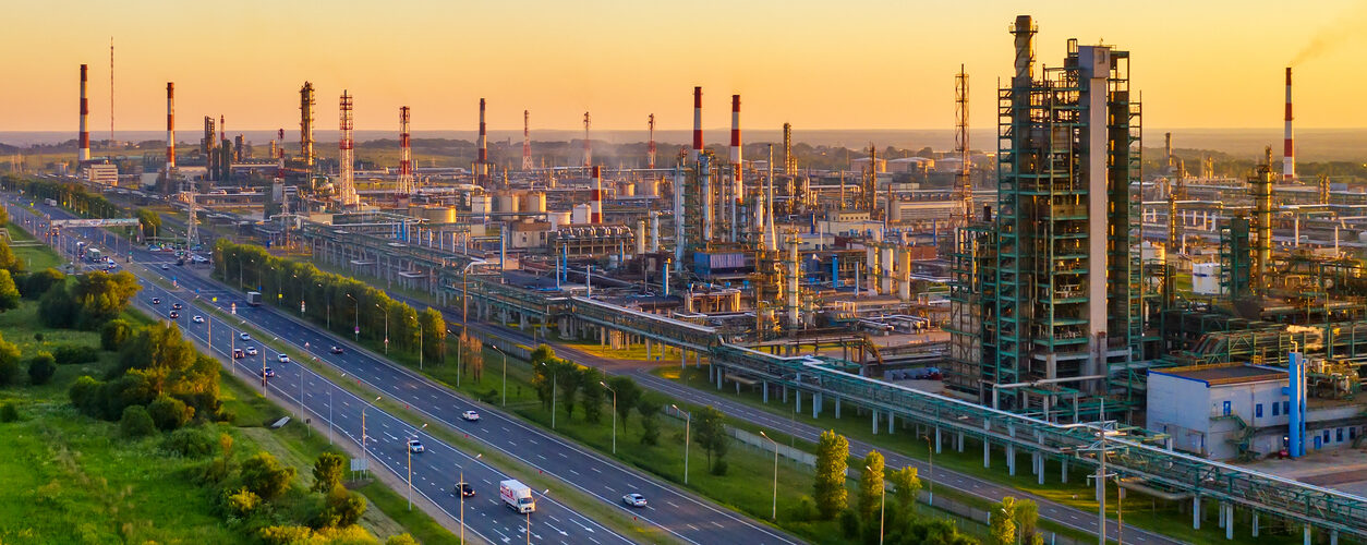 Aerial drone view of petrol industrial zone or oil refinery in Yaroslavl, Russia during sunset time.