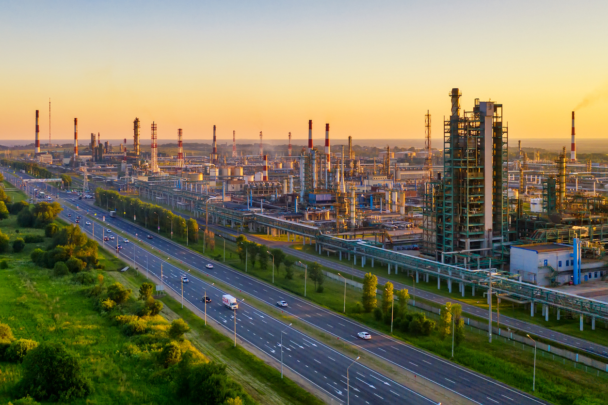 Aerial drone view of petrol industrial zone or oil refinery in Yaroslavl, Russia during sunset time.