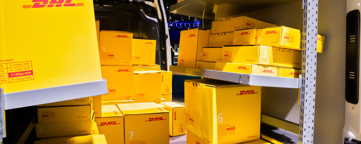DHL delivery van interior with boxes at the Autosalon. Brussels, Belgian - Jan 18, 2019