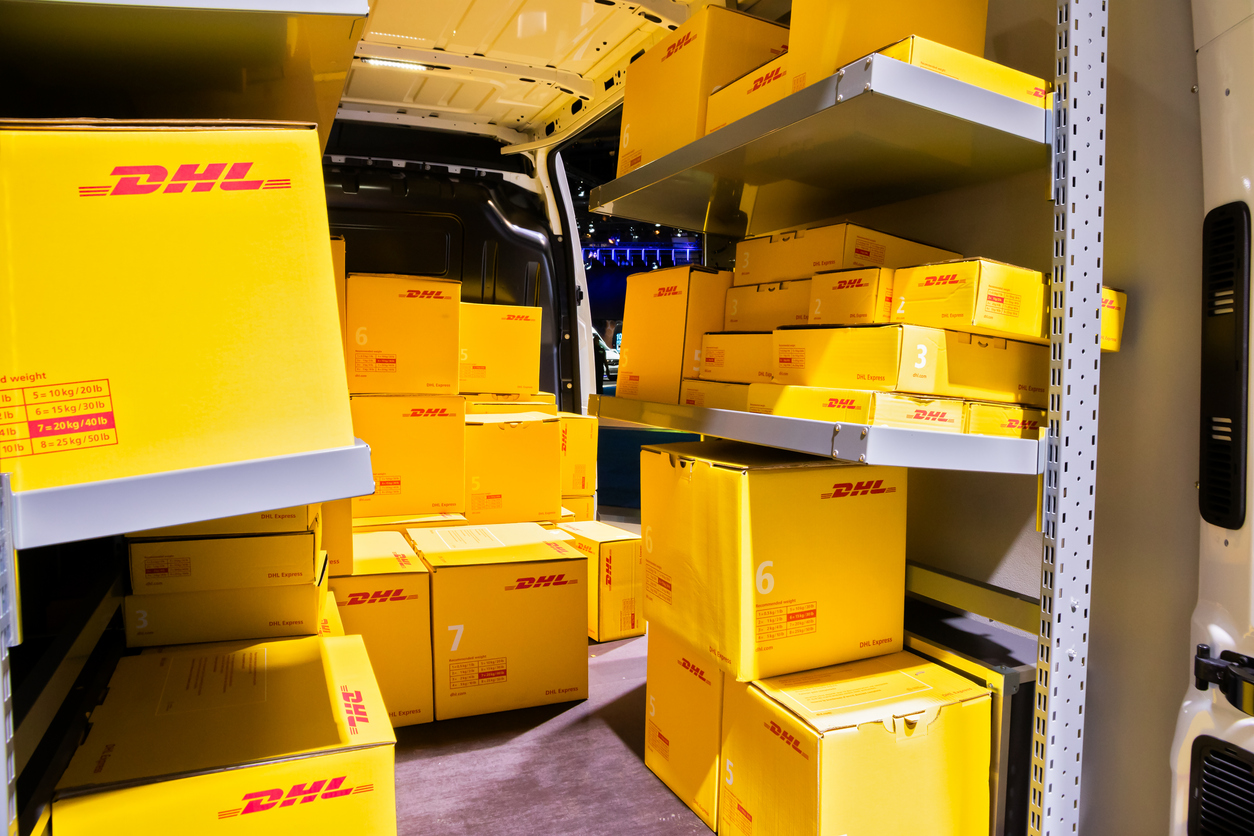 DHL delivery van interior with boxes at the Autosalon. Brussels, Belgian - Jan 18, 2019