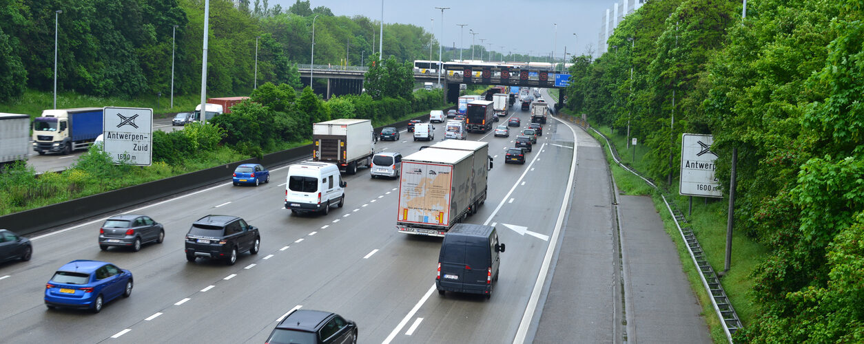 Berchem, province Antwerp, Belgium - May 12, 2023: multiple highway autostrade Ring 1 A1 commuters in their cars and truck drivers riding slowly in a traffic jam