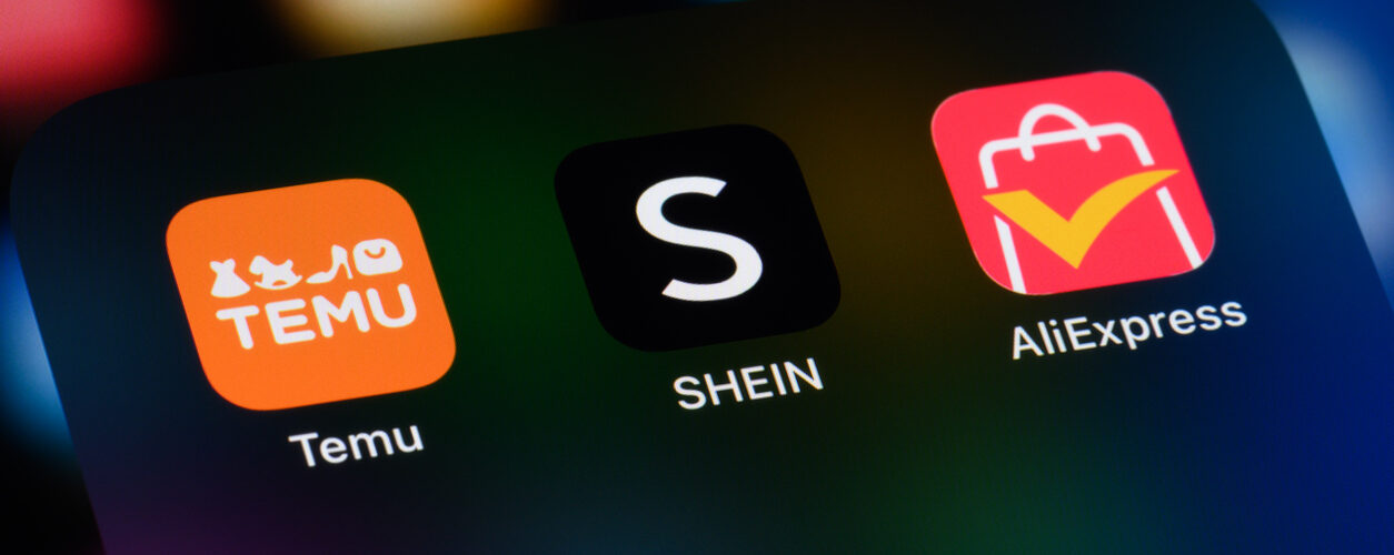 Toronto, Canada - April 18, 2025: Chinese e-commerce apps on a smartphone - Temu, Shein, and AliExpress.