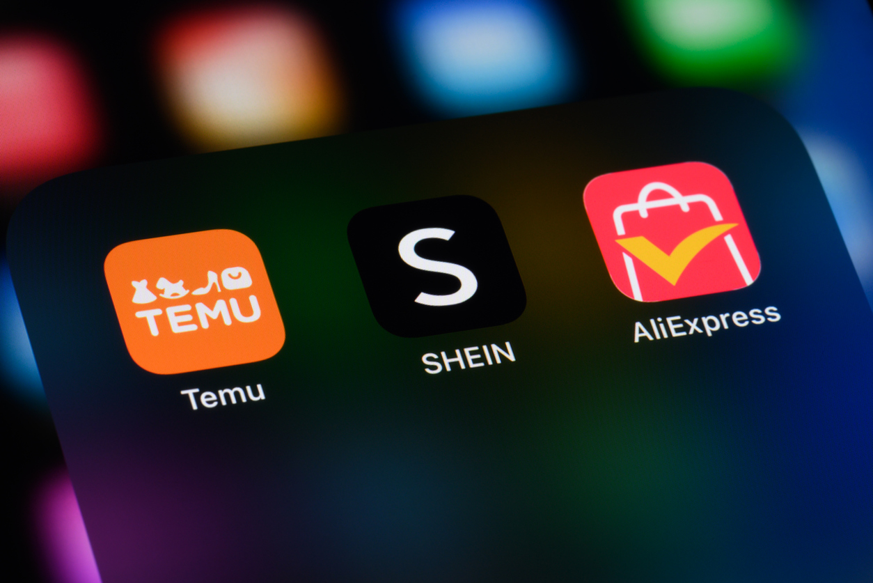 Toronto, Canada - April 18, 2025: Chinese e-commerce apps on a smartphone - Temu, Shein, and AliExpress.