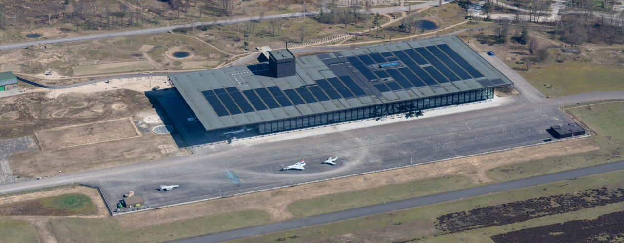Soesterberg, The Netherlands - March 2020: Aerial photo Military Museum with American war planes on the apron.